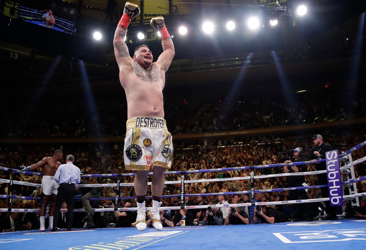 Andy Ruiz celebrates after stopping Anthony Joshua during the seventh round of a heavyweight championship boxing match Saturday, June 1, 2019, in New York. (AP Photo/Frank Franklin II)