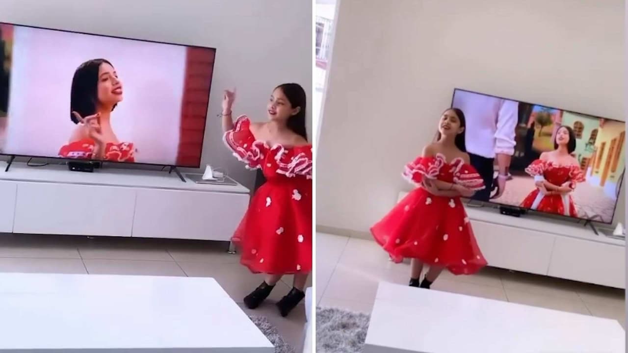 Con todo y vestido rojo, mini fan se viste como Ángela Aguilar y la imita cantando ‘Dime Cómo Quieres’