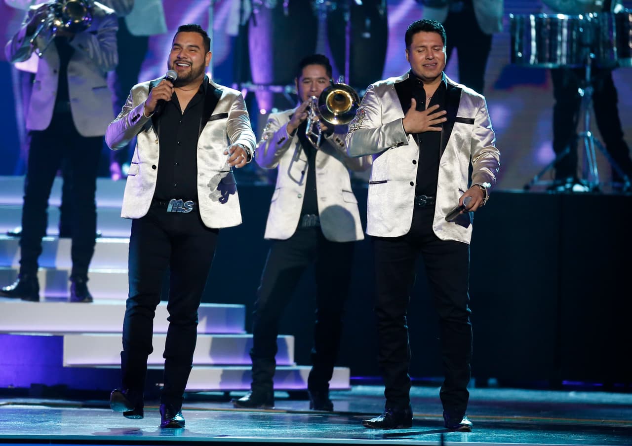 Alan Ramirez, left, and Oswaldo Silvas, of Banda Sinaloense MS de Sergio Lizarraga, perform at the Billboard Latin Music Awards on Thursday, April 25, 2019, at the Mandalay Bay Events Center in Las Vegas. (Photo by Eric Jamison/Invision/AP)