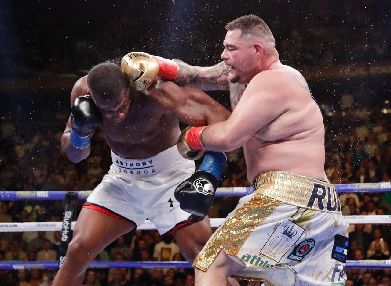 Andy Ruiz, right, punches Anthony Joshua during the seventh round of a heavyweight championship boxing match Saturday, June 1, 2019, in New York. Ruiz won the bout. (AP Photo/Frank Franklin II)