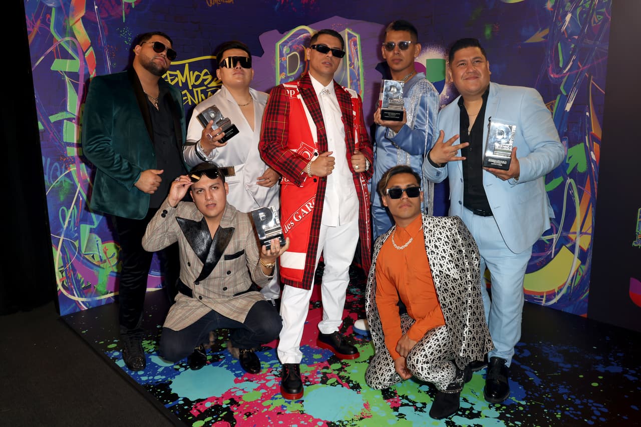 CORAL GABLES, FLORIDA - JULY 22: Grupo Firme poses with their award at Premios Juventud 2021 - Media Center at Watsco Center on July 22, 2021 in Coral Gables, Florida. (Photo by Alberto Tamargo/Getty Images for Univision)